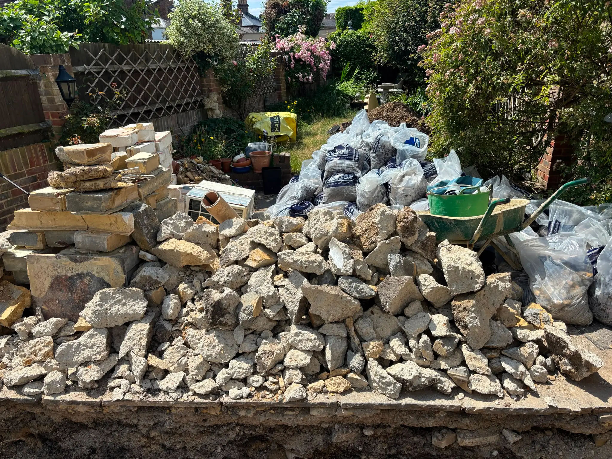 Concrete and masonry rubble gathered for a property clearance.